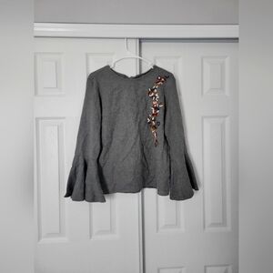 Chic Gray Top with Colorful Embellishments